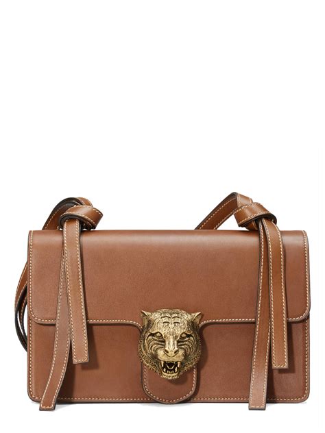 gucci tiger brown bag|gucci handbag with lion head.